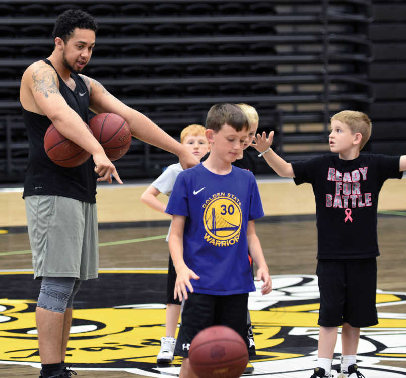 After attending Gene Bess Basketball Camp as kids, Willie Lucas, Jacob Shoemaker give back as camp assistants