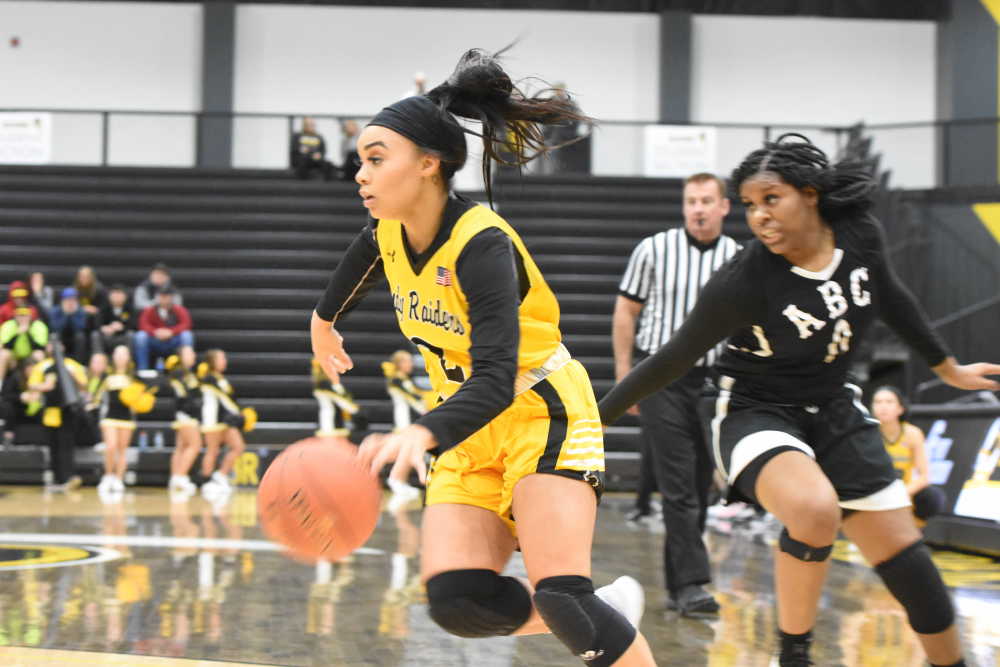 Hollis keeps making 3's as Lady Raiders rout Buffaloes