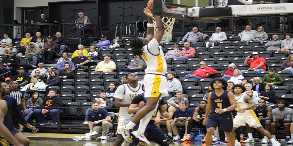 Raiders fall short in overtime of season opener